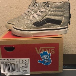 Silver and black toddler girl vans